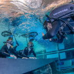 Young divers at Deep Dive Dubai experiencing their first dive with the BLU3 Nomad system.