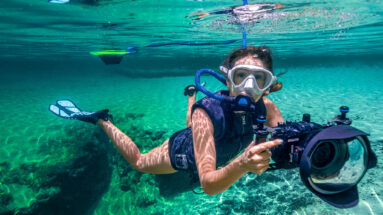 Kimber from Water Bear Photography relying on the BLU3 dive system while documenting the clear springs.