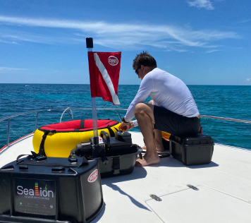 SeaLion-System-Preparation-on-Boat Diver setting up SeaLion Dive System on a boat