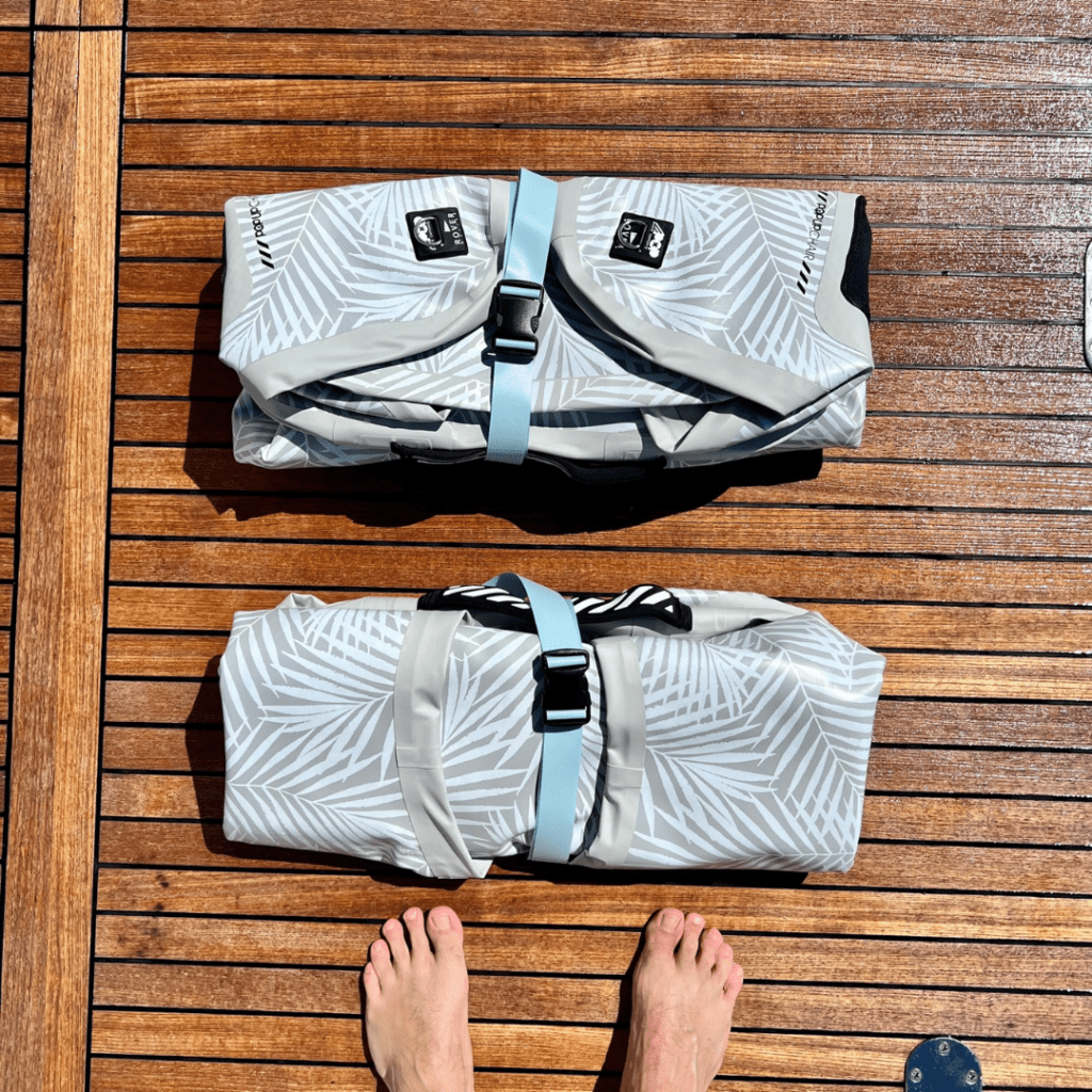 Compact-Deflated-High-Tide-POPup-Chairs Two deflated High Tide Collection POPup Chairs packed neatly on a yacht deck