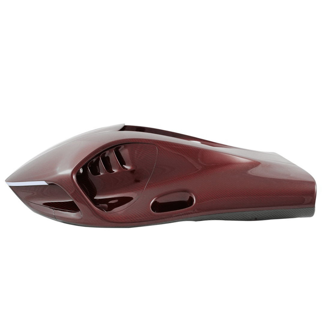 Side view of the SeaNXT Elite in red carbon finish, highlighting its sleek and aerodynamic design.